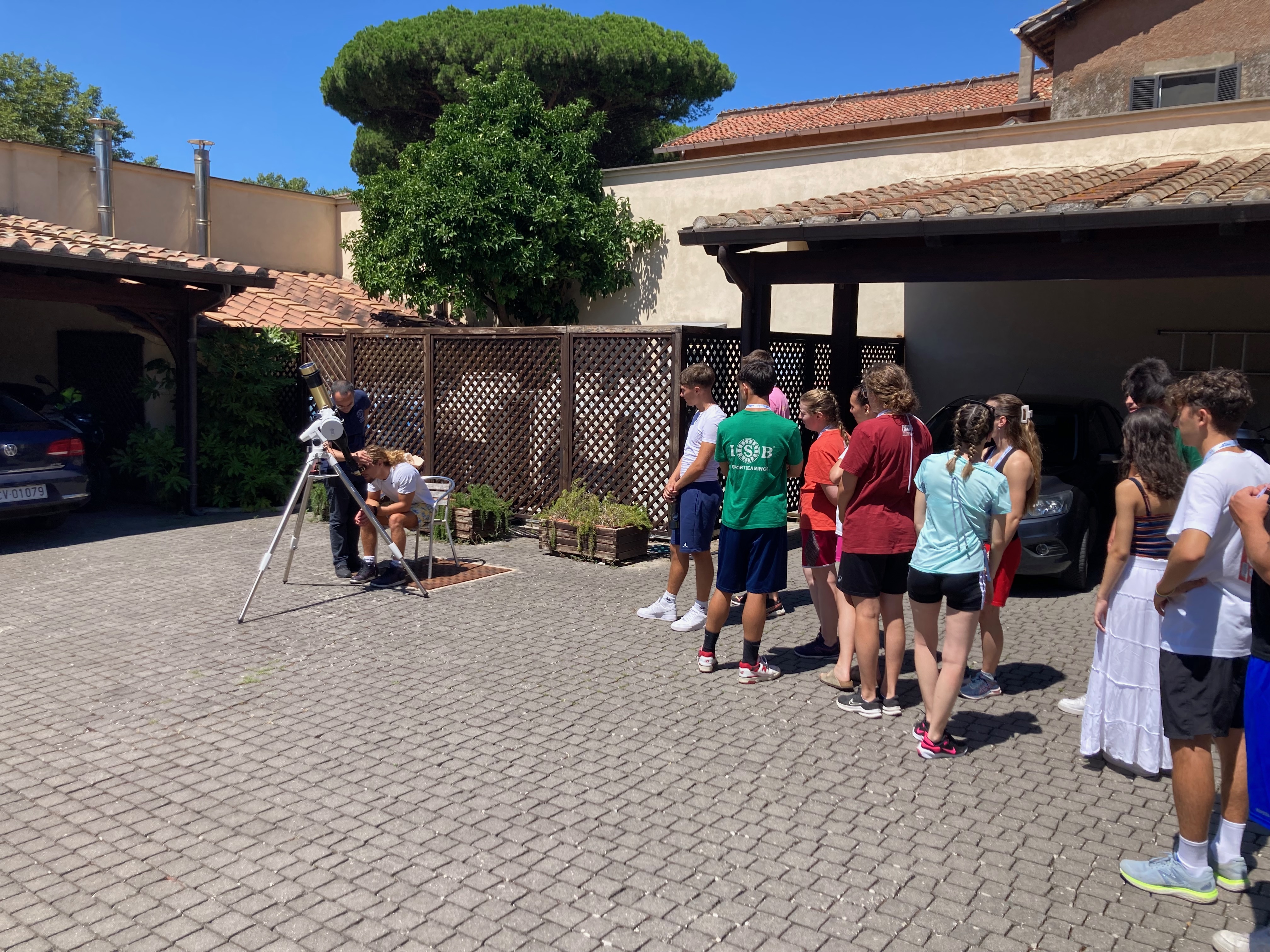 Youth observing the Sun spots and flares through a solar telescope