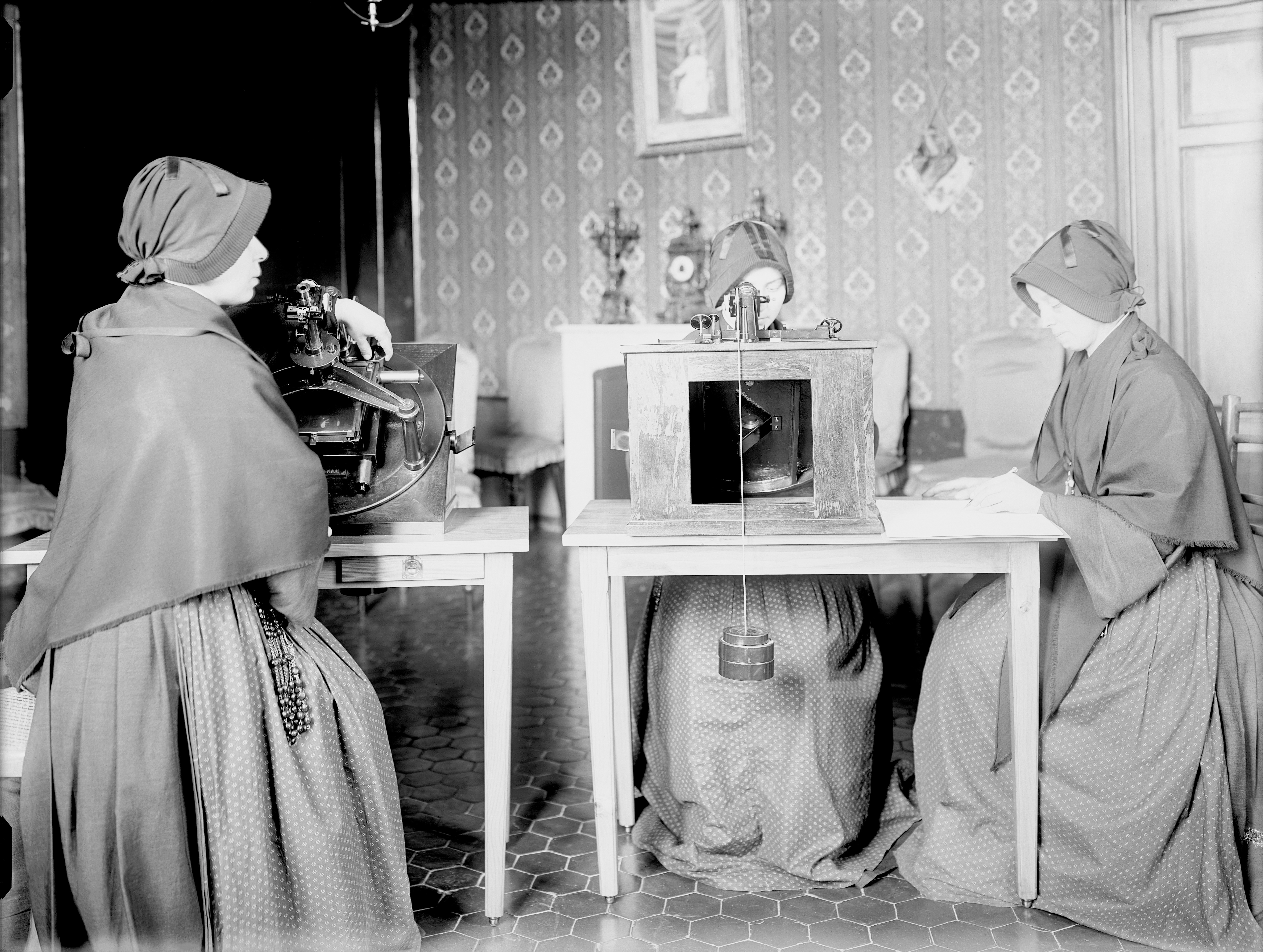 Sisters of the Institute of the Child Mary measuring photographic plates