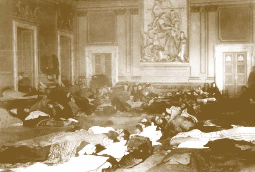 Refugees sheltering in a papal audience hall